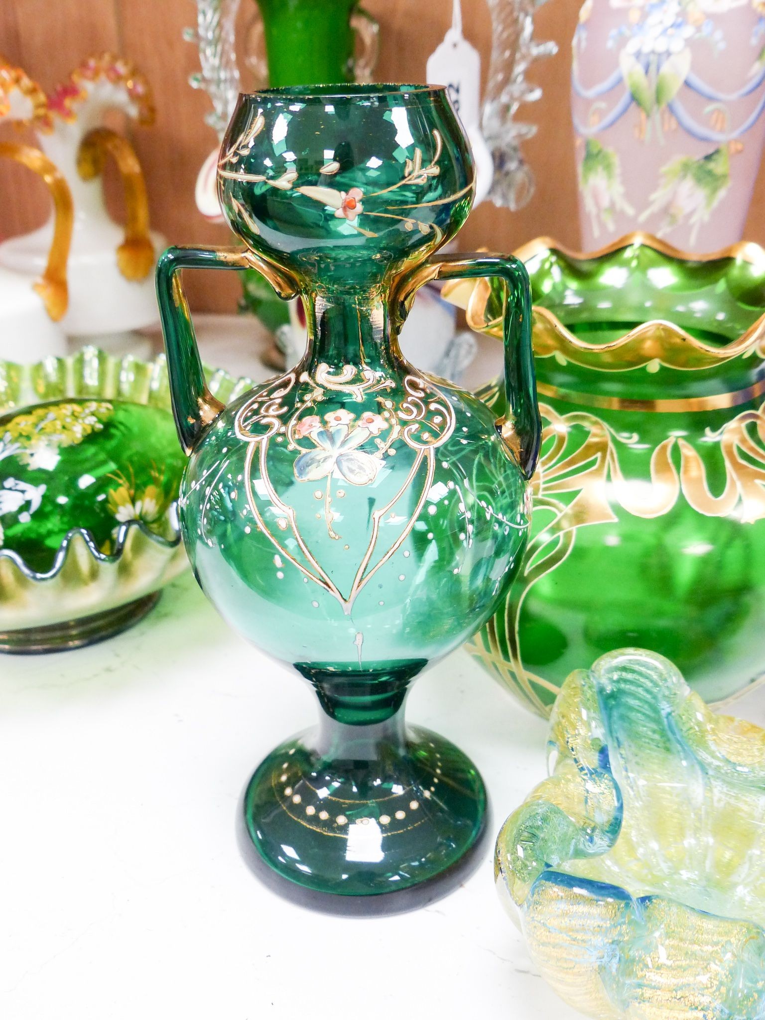 A group of Victorian style fancy glass vases and jugs and other coloured cut glass etc., tallest 29 cm